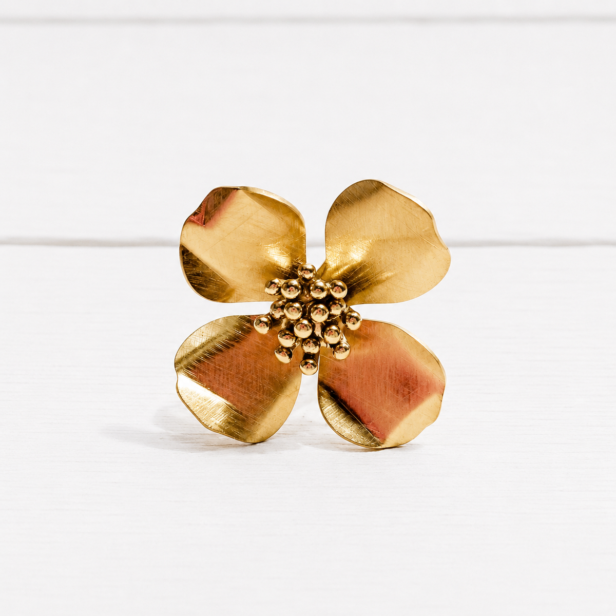 Anillo flor cuatro pétalos