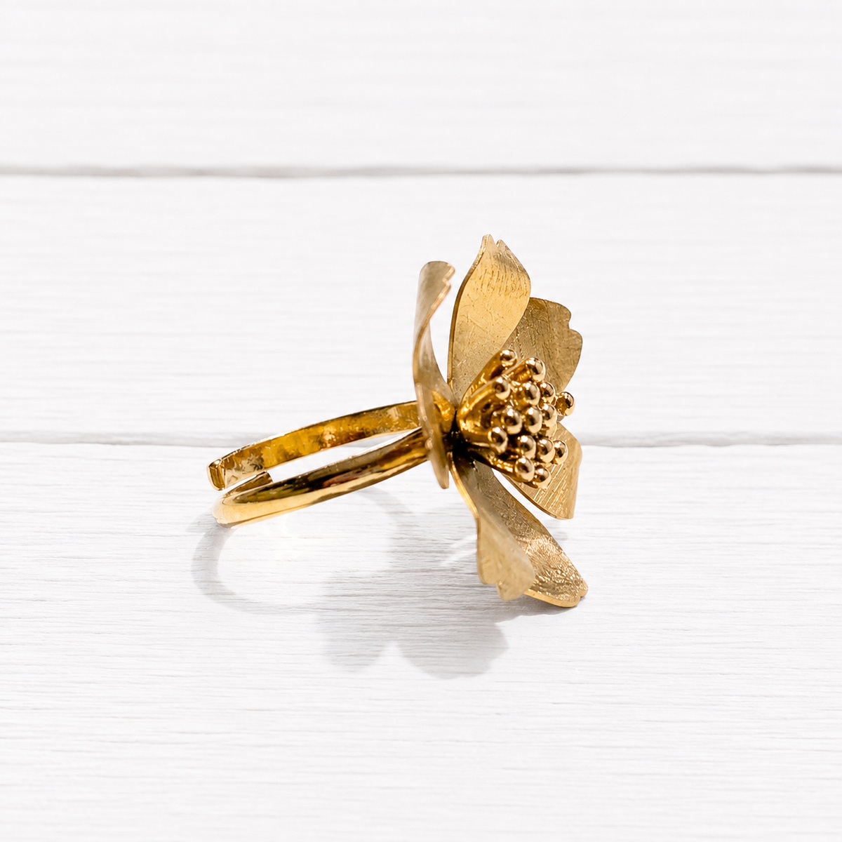 Anillo flor acero