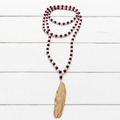Collar bicolor pluma