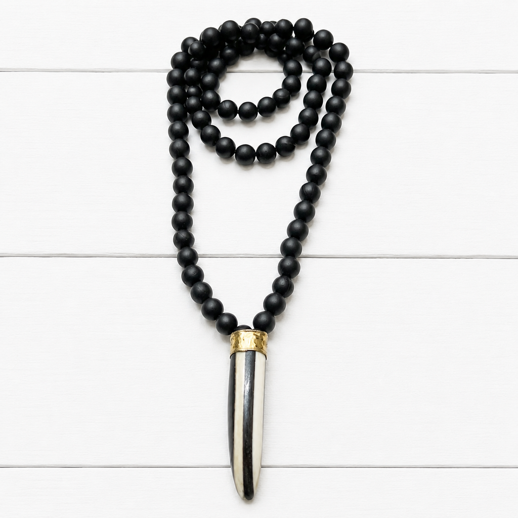 Collar pieza franjas semillas negro