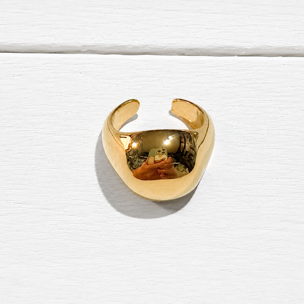 Anillo acero dorado bola