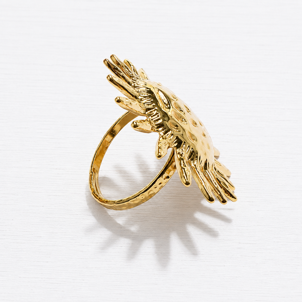 Anillo acero dorado sol