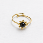 Anillo acero dorado sol piedra negra