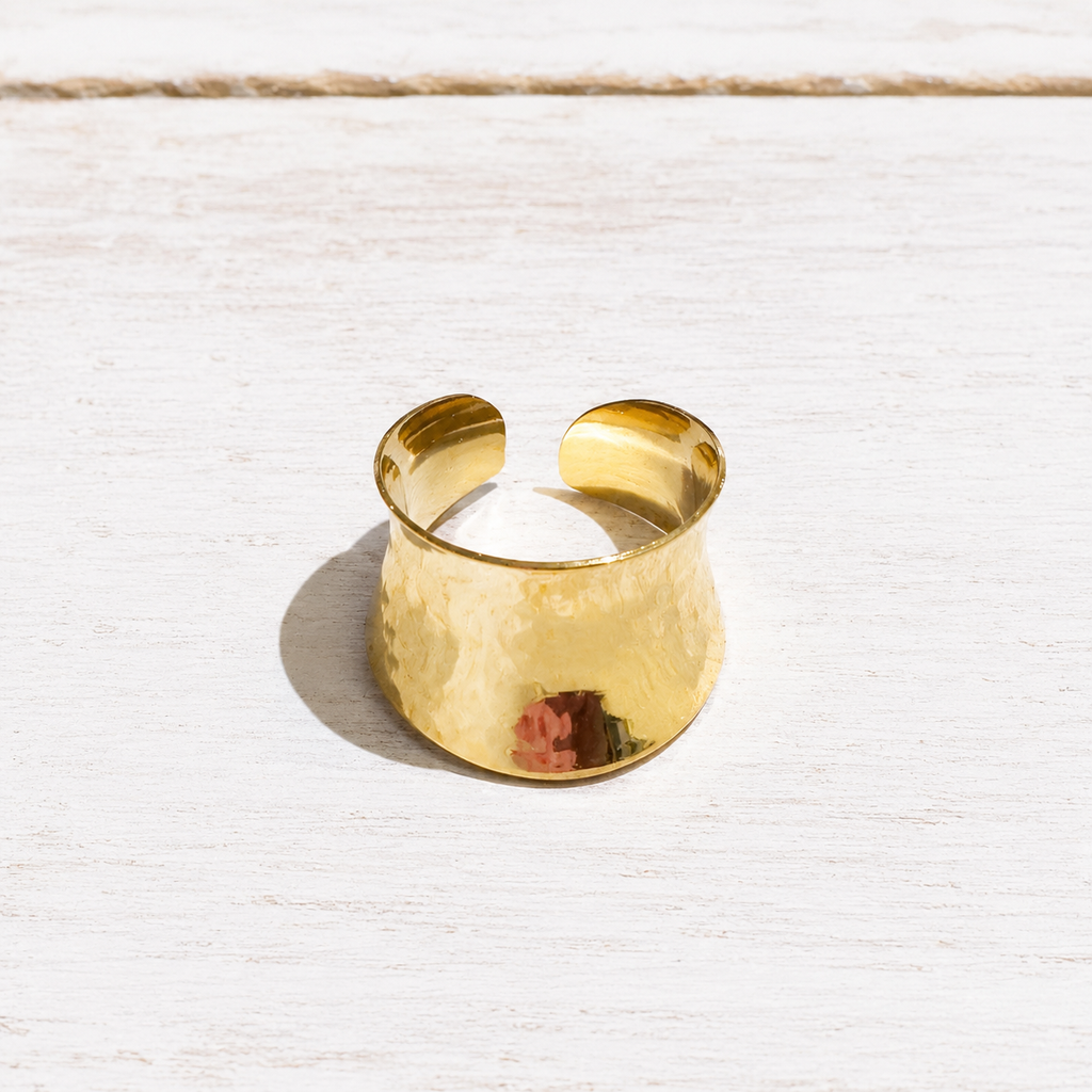 Anillo acero dorado cóncavo
