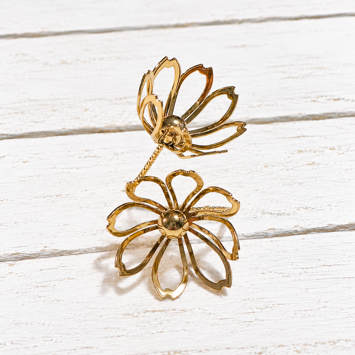 Anillo acero dorado doble flor