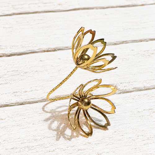 Anillo acero dorado doble flor