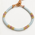 Pulsera cuero dorado agua y berenjena